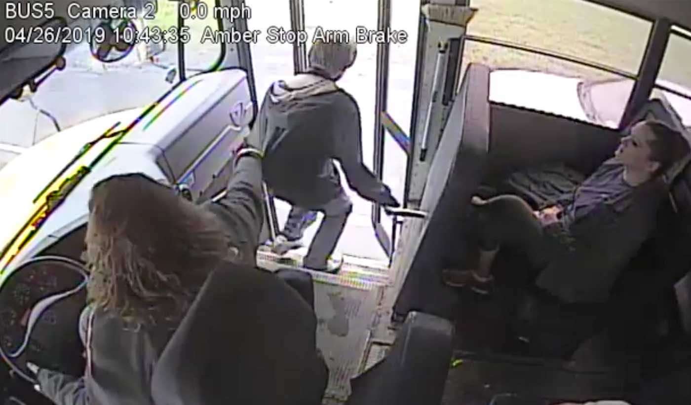 Watch Quick-Thinking Bus Driver Stop Youngster Just As He Was About to Step in Front of Speeding Car 
