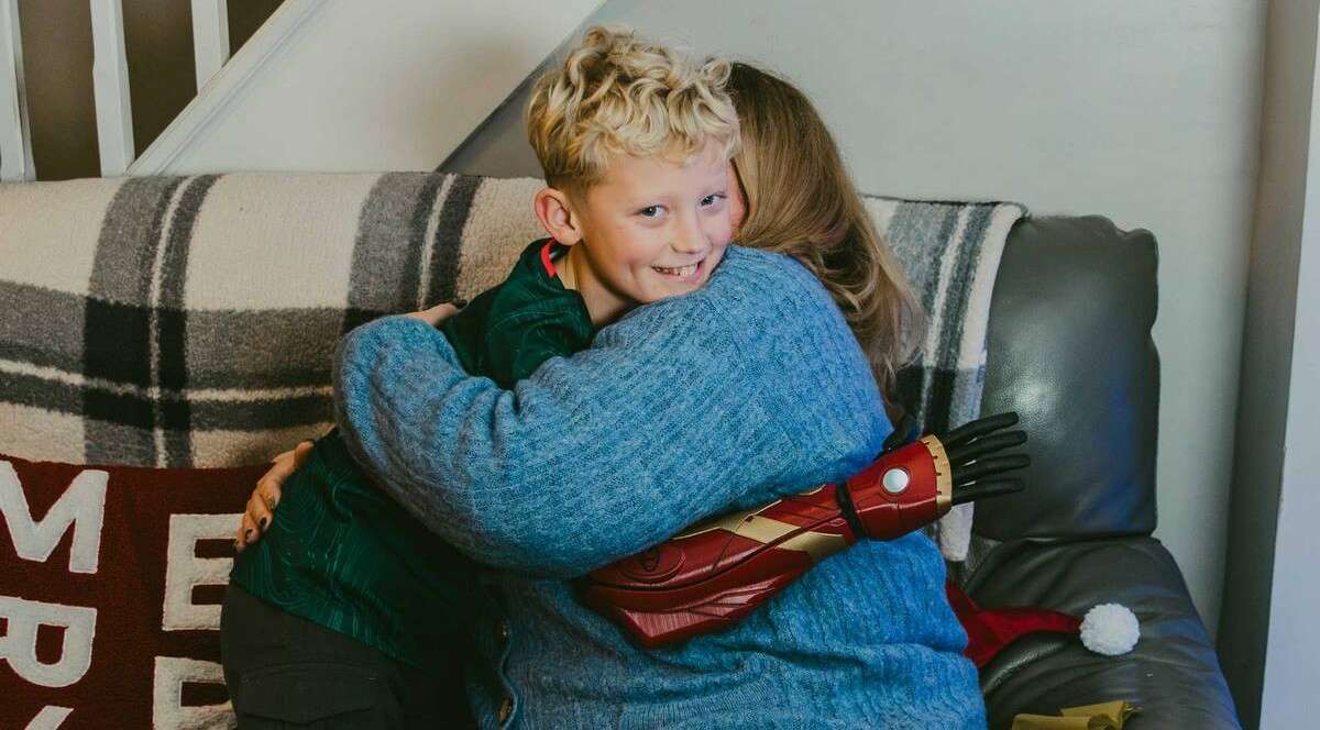English Boy Unwraps Iron Man Prosthetic Arm-a Gift from His Nation Days Before Christmas 