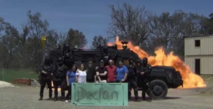 Watch Police Fulfill Young Cancer Patient's Wish to "Blow Stuff Up" 