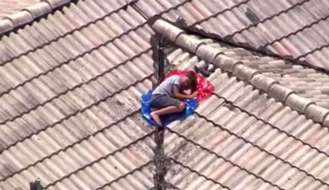 Police Hunt Ends When TV Station Spots Boy Napping on Roof 
